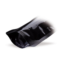 Pungi doypack negre, cu valvă de aromă — Detaliu de material, cu accent pe grosimea foliei și calitatea prelucrării
